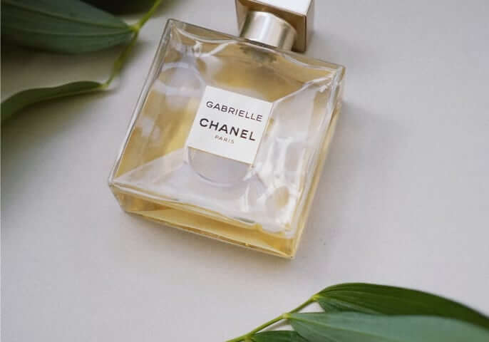 Gabrielle Chanel perfume on white surface